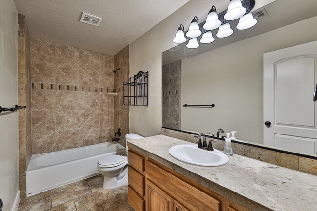 Building Photo - "Spacious 4-Bedroom Retreat with 3,584 Sq ...