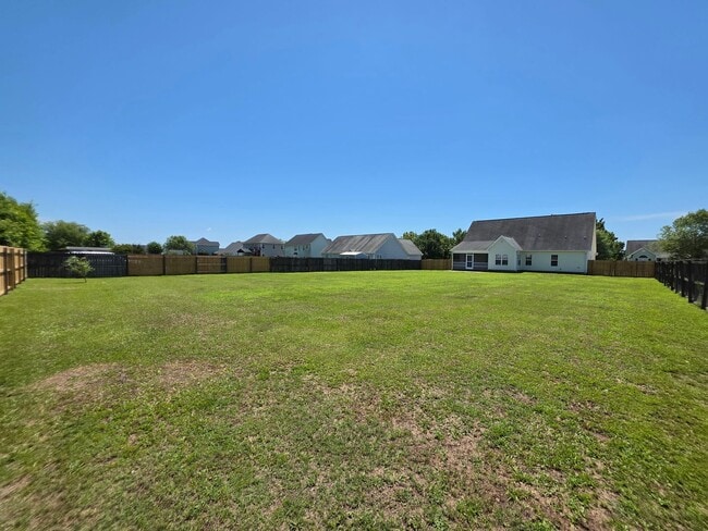 Building Photo - Spacious 4-Bedroom Bryan Farms Beauty with Bonus Suite, Large Fenced Yard & RV/Boat Parking!