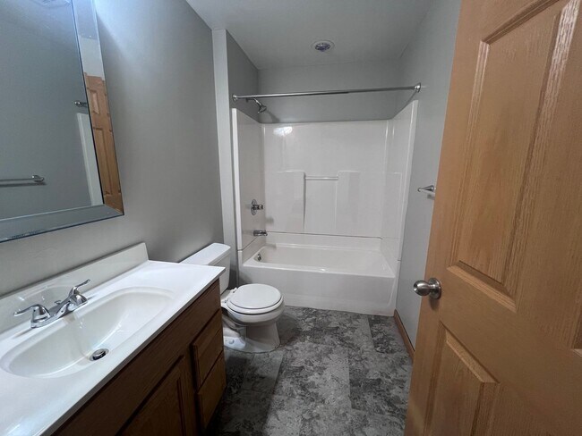 Building Photo - Spacious Duplex in Walker! Two Stall Garage!
