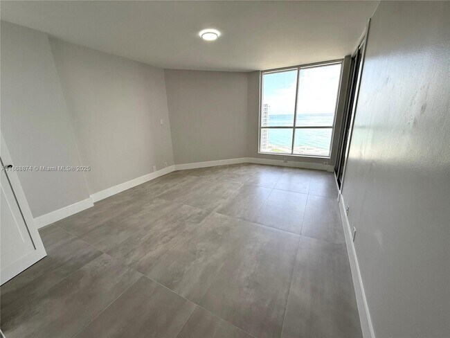 Building Photo - 6767 Collins Ave