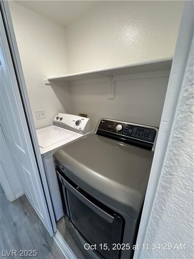 Building Photo - SPACIOUS FIRST-FLOOR CONDO LOCATED IN A GA...