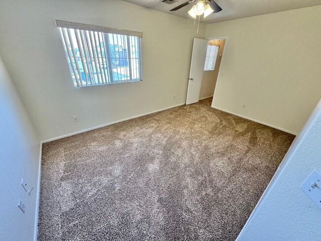 Building Photo - WELCOME TO THIS SPACIOUS 4-BEDROOM, 2.5-BA...