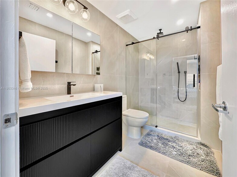 Building Photo - 6301 Collins Ave