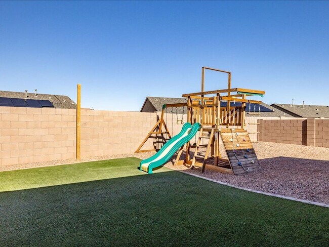 Building Photo - Spacious 4-Bedroom Home with Open Layout & Turf Backyard