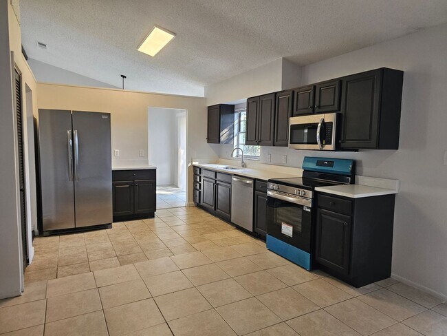 Building Photo - Completely Renovated! - Inviting 3-bedroom, 2-bath home located in the well-established Lake Spar...