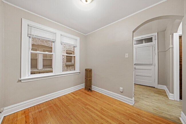 Building Photo - Sunny, Convertible Studio with Two Rooms a...