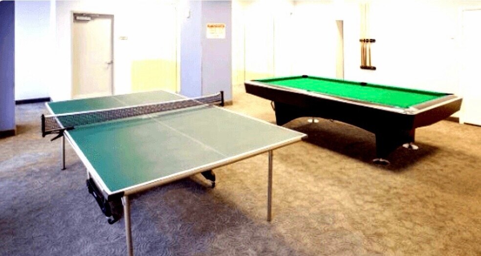 Building Photo - 6365 Collins Ave