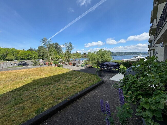 Building Photo - Updated 2-Bedroom Condo with Water Views, 2 Parking Spaces & Poolside Location