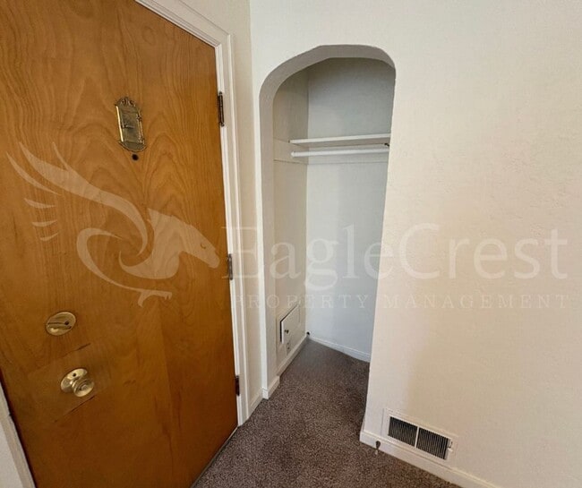 Building Photo - Three Bedroom, Two Bathroom House with Fenced Yard and Outdoor Fireplace