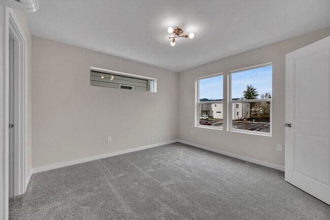 Building Photo - Move In Special Up to 3 Months Free - Newb...