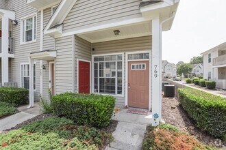 Building Photo - Cathedral Ceilings & Coastal Vibes—This 2B...