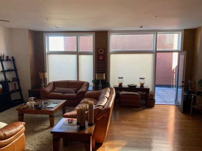 Living room view - private deck is located per door in living room - 1714 W Cary St