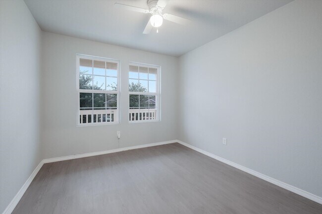 Building Photo - Open-Concept Living with New Flooring