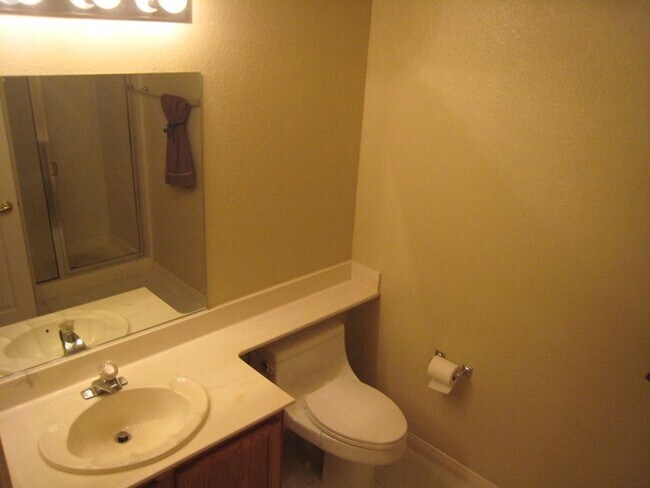 Building Photo - 2nd Story Condo in gated community close to the pool.