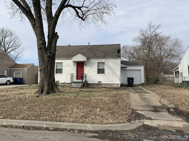 Building Photo - 220 S 70th E Ave