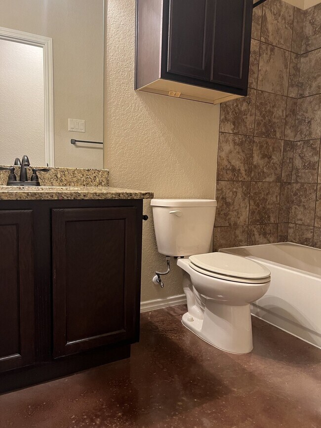 Building Photo - 3 Bedroom Duplex with Stained Concrete Floors and Greenbelt Views!