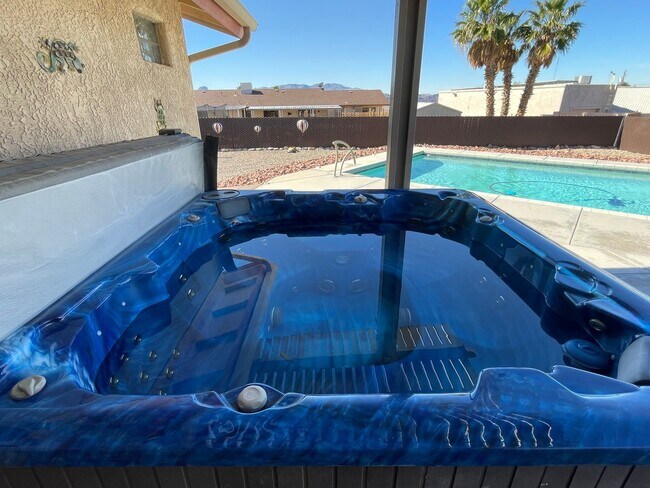 Building Photo - OWNER'S SUMMER SPECIAL-$300 OFF first 3 months! Sparkling Pool Home!