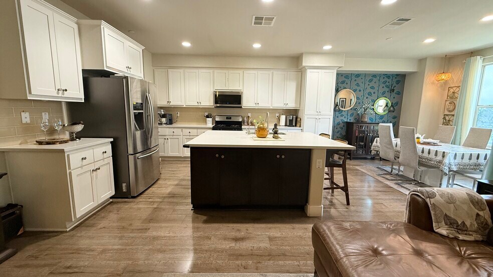 Kitchen- Tall cabinets. Spacious! - 27 Rogers Ln