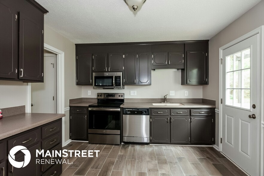 Building Photo - 9020 Louvaine Dr
