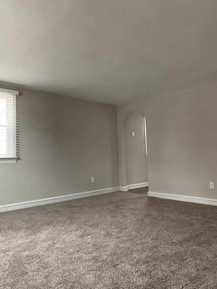 Living room looking towards kitchen entrance - 1310 W Kings Hwy