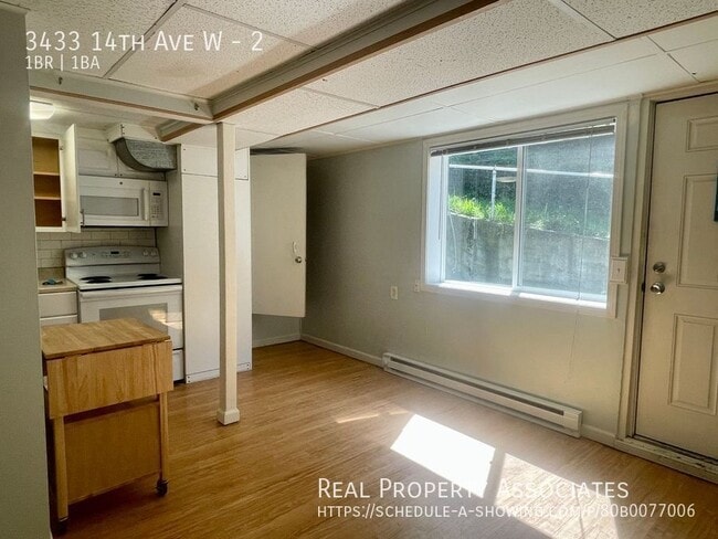 Building Photo - 3433 14th Ave W