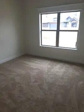 Building Photo - 1018 N Genoa Ave