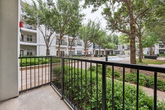 Spacious Balcony at Addison Keller Springs Apartments in Addison, TX - Addison Keller Springs
