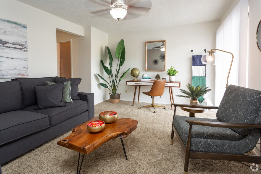 2BR, 2.5BA - 1,040 SF - Living Room - Mountain Village Apts.