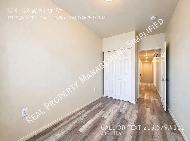 Building Photo - 326 1/2 W 51st St-