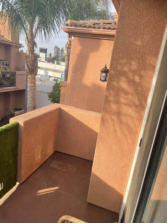 Balcony (green turf installed for added privacy but is removal upon request) - 21832 S Vermont Ave