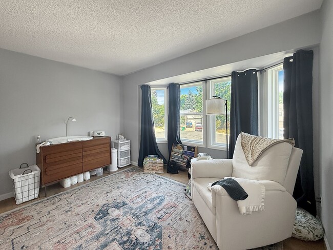 Building Photo - $0 DEPOSIT OPTION. SPACIOUS 4-BEDROOM CENT...