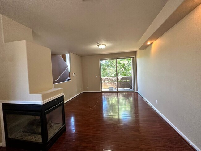 Building Photo - Gated Hayward Townhome with 2-Car Garage & Private Patio