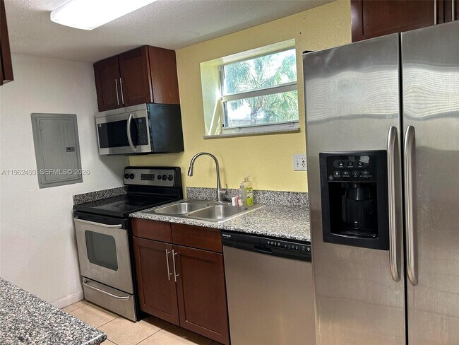 Building Photo - 8950 SW 69th Ct