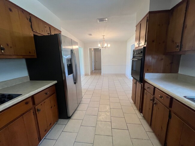 Building Photo - Charming 4-Bedroom Brick Home on Spacious ...