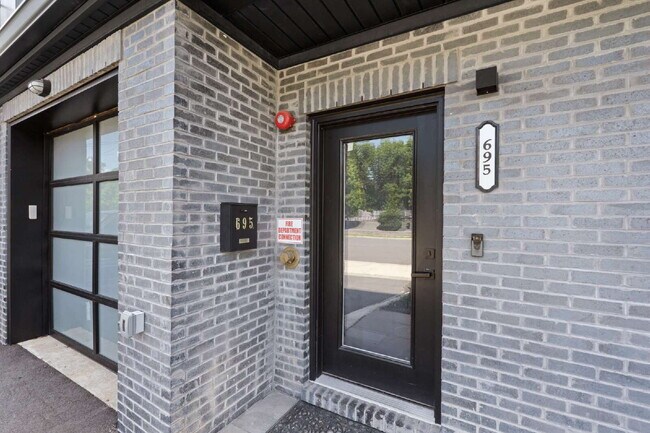 Building Photo - Movie in special, first 1/2 month rent is FREE! Charming 2-Bedroom Condo with 2 Full & 2 Half Bat...