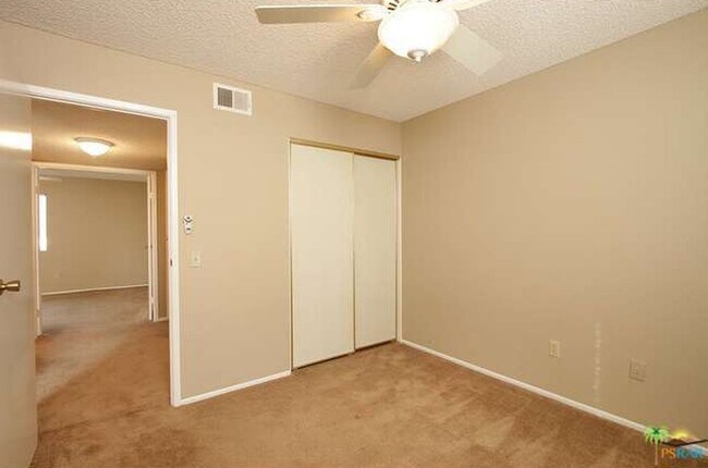 Building Photo - Spacious 4-Bedroom Condo in Indian Canyon ...