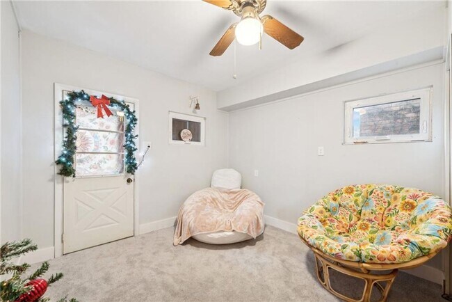 Building Photo - Bright and Roomy 6-Bedroom in McKees Rocks with Garage