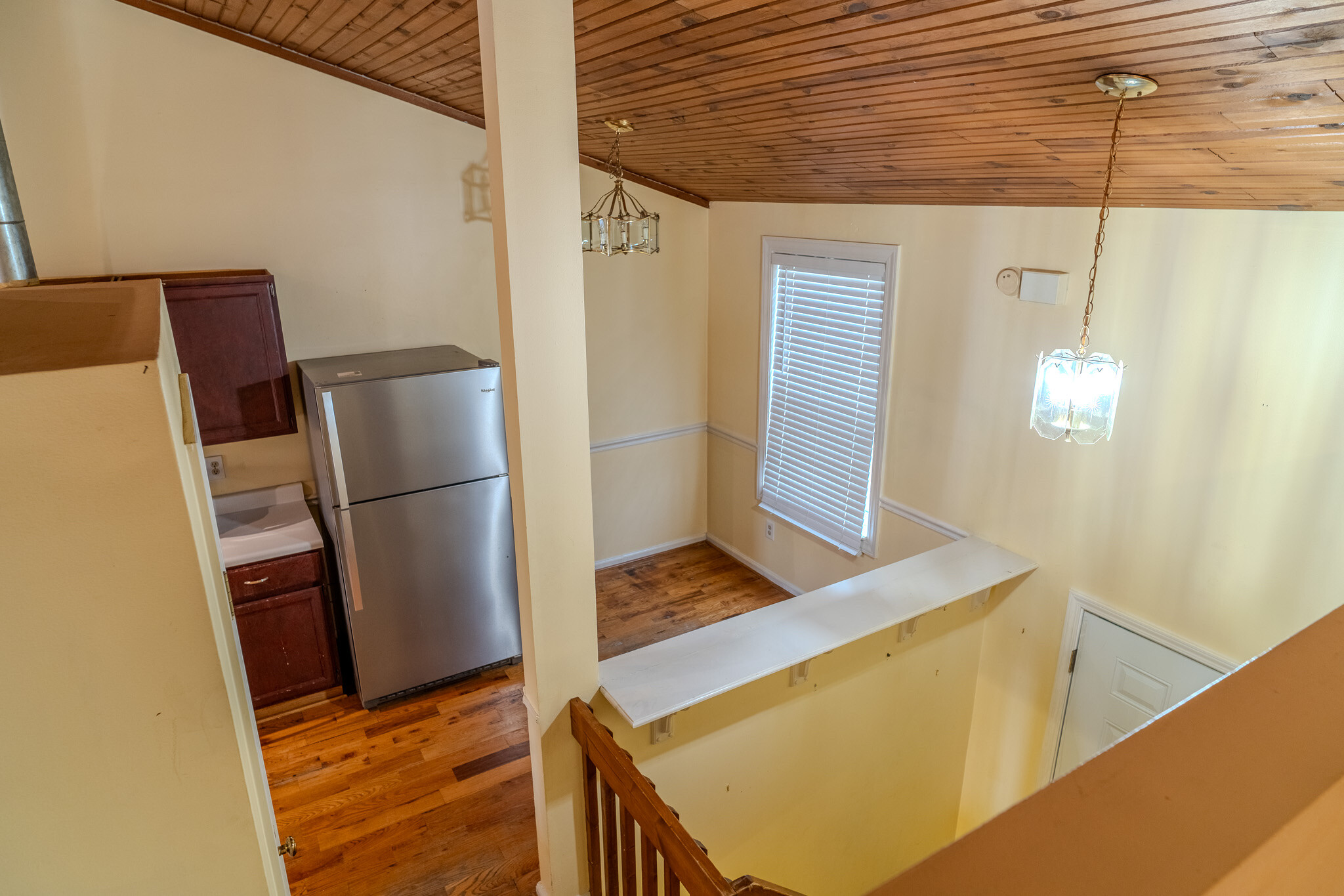 Loft view of front door and kitchen - 3408 Springlake Dr