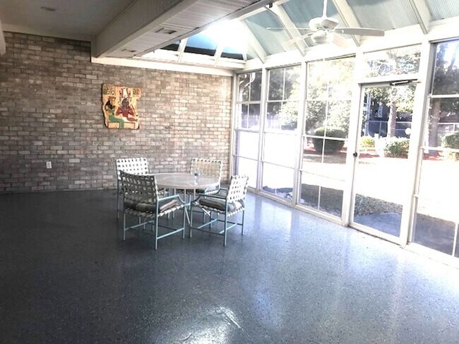 Building Photo - 4 Bedroom, 2.5 Bath, Pet Friendly Home with Fenced Yard & Sunroom! Available Soon!