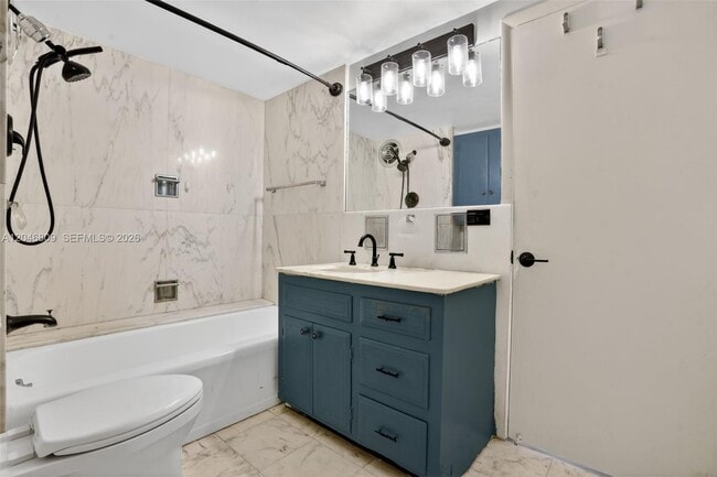 Building Photo - 10240 Collins Ave