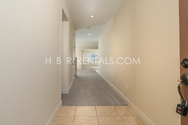 Building Photo - Spacious 4-Bed, 3-Bath Home with a Beautiful Garden in Mountain House! *FIRST FLOOR BEDROOM and F...