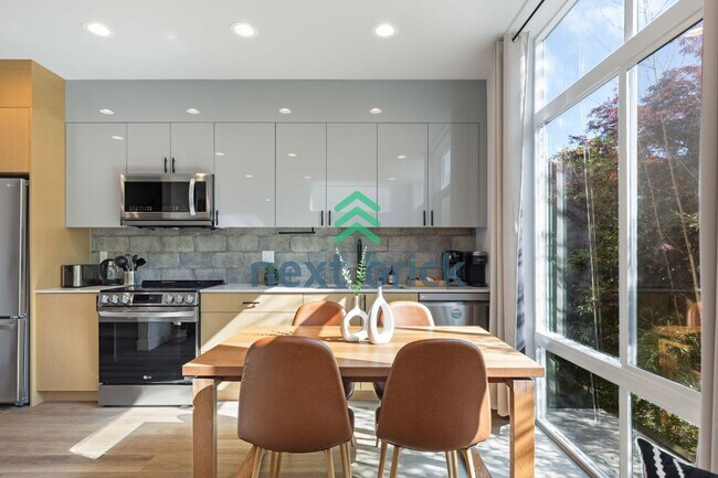 Building Photo - Offer: Unfurnished option available at $3,250, with an optional furnished package for an addition...