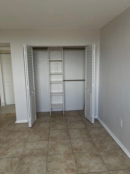 #2 bedroom closet - doors open - 1251 NE 108th St