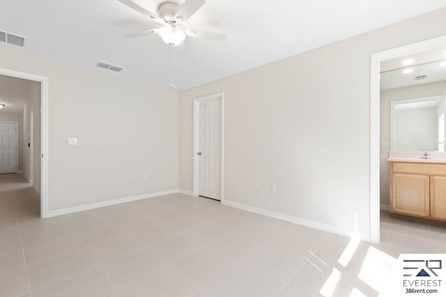 Building Photo - FULLY FENCED, LIKE- NEW 3/2/1 TOWNHOUSE ON A CUL DE SAC IN BEAUTIFUL SEMINOLE WOODS