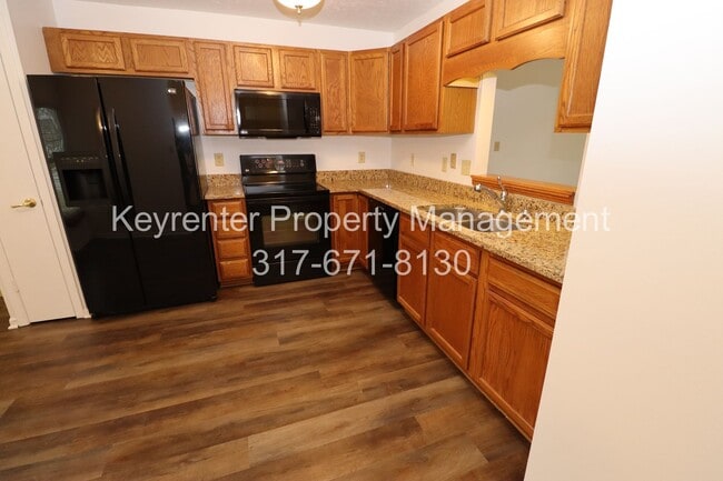 Building Photo - Discover this well-maintained 3-bedroom, 2-bath home in Indianapolis featuring an attached garage...