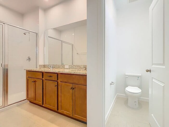 Building Photo - New Luxury Townhome in Celebration, FL Corner unit. All porcelain tiled floors. Aleutian model by...