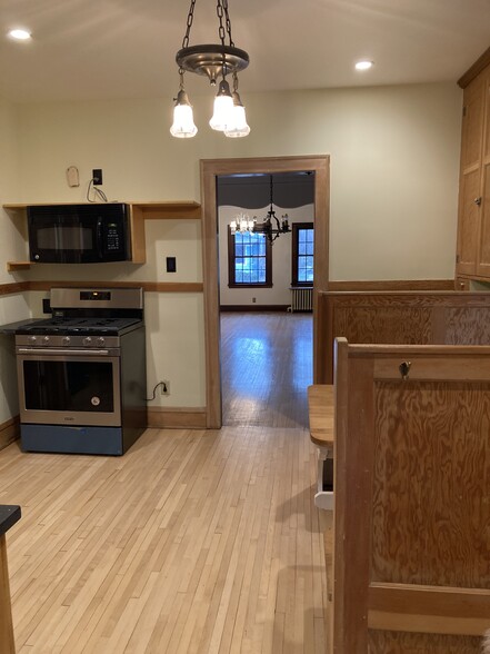 Kitchen looking into dining & living room - 1074 Goodrich Ave