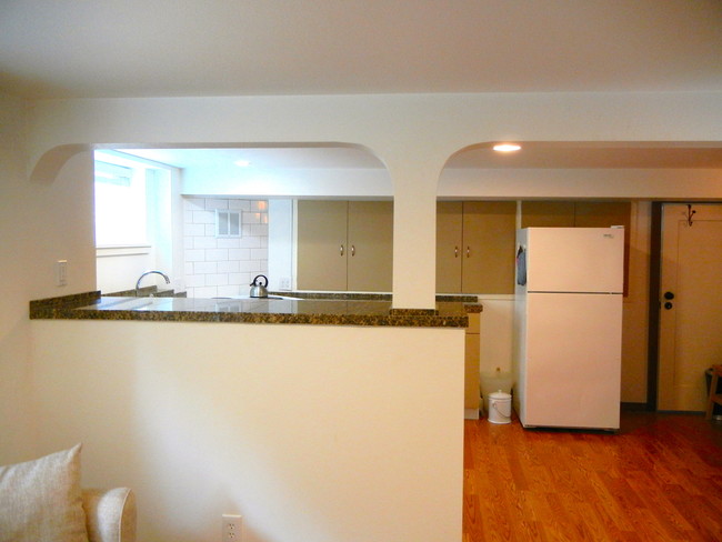 Living room facing kitchen/dining area - 14027 Roslyn Pl N