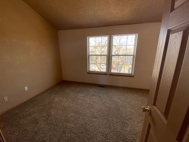 Building Photo - 9606 W Chatfield Ave