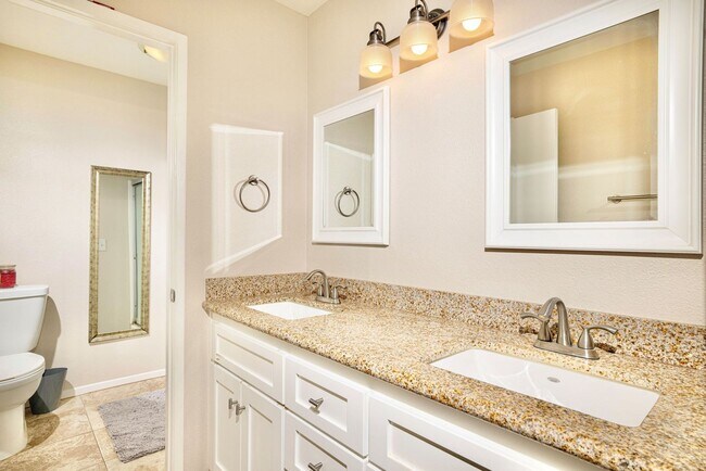 Building Photo - Beautifully Updated & Remodeled Upstairs Condo Unit in the Serene Pala Mesa Villas HOA Community,...